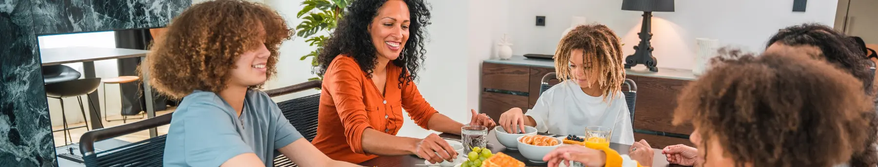 Happy family around the table